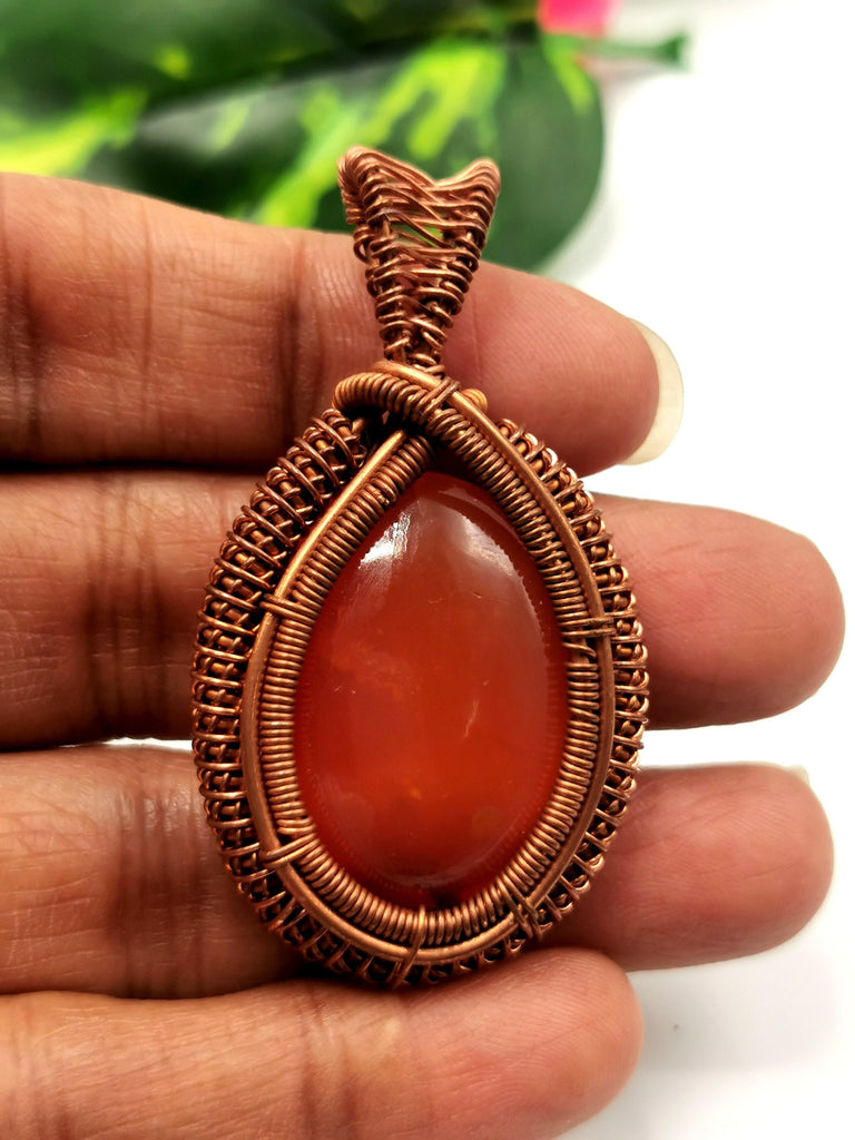 Stunning carnelian pendant with intricate copper wire wrapping - gemstone/crystal  jewelry