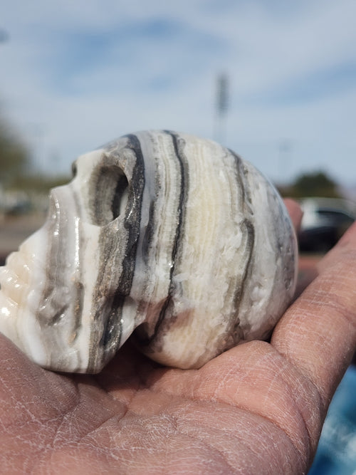 Zebra Onyx Skull Carving: A Fusion of Art, Symbolism, and Spiritual Significance | Crystal Decor | Crystal Healing