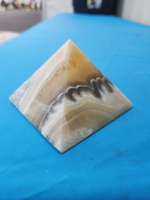 Zebra Onyx Pyramid: A Powerful Symbol of Balance, Protection, and Energy Amplification