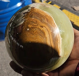 Green Onyx Sphere: A Harmonious Blend of Beauty, Healing, and Elegance for Your Home