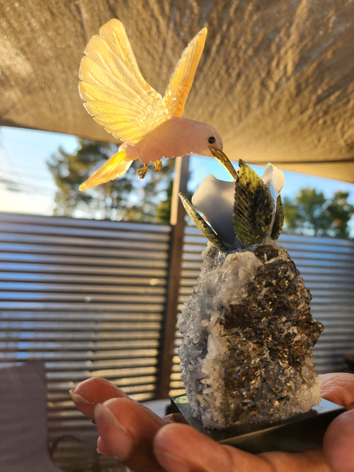 Rose Quartz and Yellow Calcite Bird carving on Agate Rose Perched on Crystal Geode with Onyx Base – A Symbol of Love, Clarity and Grounded Energy