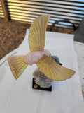 Rose Quartz and Yellow Calcite Bird carving on Agate Rose Perched on Crystal Geode with Onyx Base – A Symbol of Love, Clarity and Grounded Energy