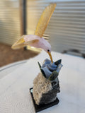 Rose Quartz and Yellow Calcite Bird carving on Agate Rose Perched on Crystal Geode with Onyx Base – A Symbol of Love, Clarity and Grounded Energy