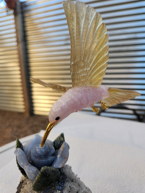 Rose Quartz and Yellow Calcite Bird carving on Agate Rose Perched on Crystal Geode with Onyx Base – A Symbol of Love, Clarity and Grounded Energy