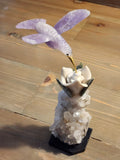 Amethyst Bird Carving on White Jade Rose with Green Jade Leaves, Perched on Calcite Geode with Onyx Base – A Harmonious Blend of Peace, Growth, and Spiritual Energy for Home, Office and Meditation Spaces