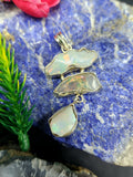 Ethiopian Opal Rough Triple Stone Pendant: A Radiant Symphony of Nature and Artistry