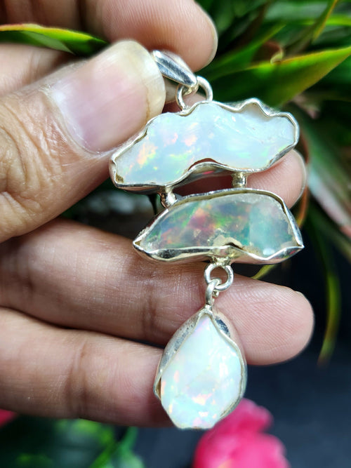 Ethiopian Opal Rough Triple Stone Pendant: A Radiant Symphony of Nature and Artistry