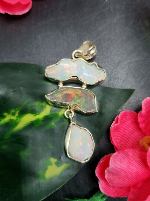 Ethiopian Opal Rough Triple Stone Pendant: A Radiant Symphony of Nature and Artistry