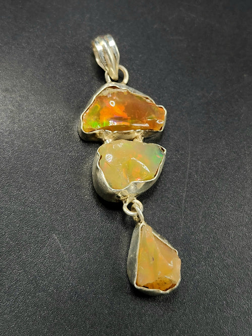 Ethiopian Opal Rough Triple Stone Pendant: A Radiant Trio of Nature's Artistry